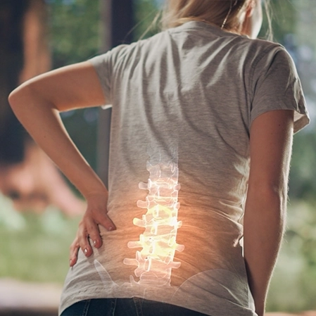Chiropractic Duluth MN Woman With Back Pain